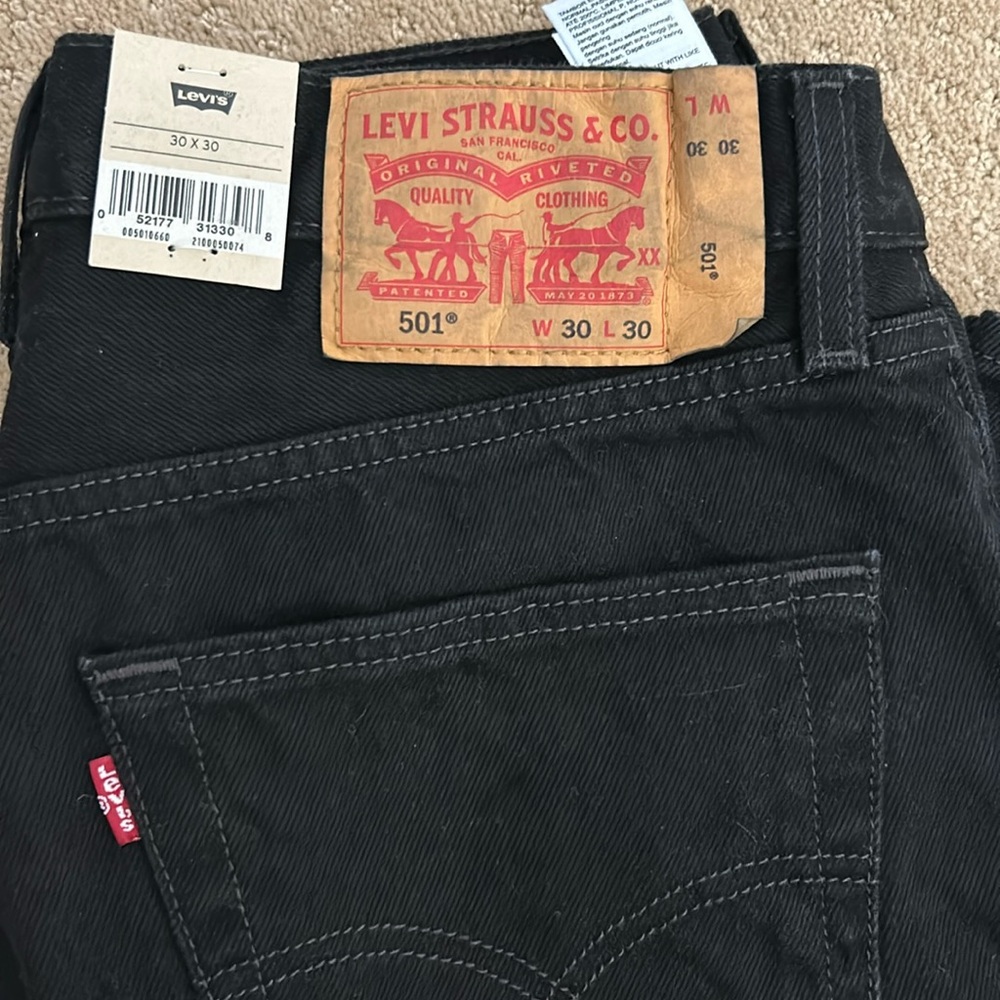 NWT.  Levi 501 30x30 black jeans.  Button up.  Never been worn